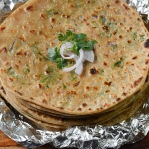 2 Payaj Paratha with Pickle  & Salad  : Rs-80